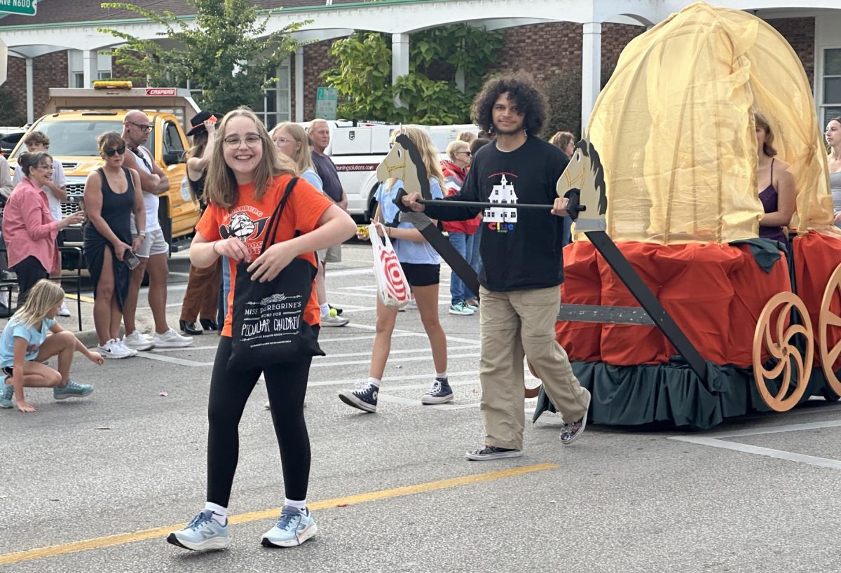 Senior Sharon Chumlea promoted "Cinderella" at the Homecoming parade in October.