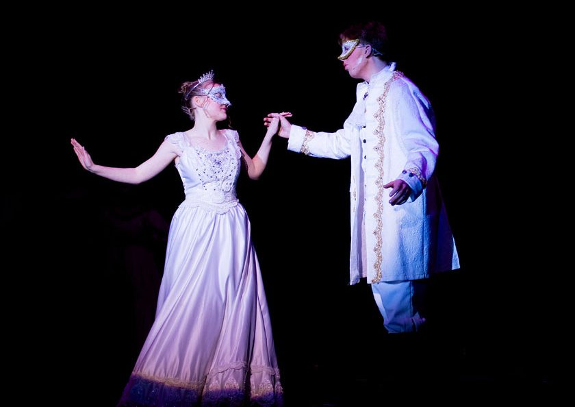 Cinderella (senior Josie Witte) and Prince Topher (sophomore Lukas Bridger) waltz at the royal ball.
                                                                                                                                    
                          photo courtesy of Deni Storm Photography